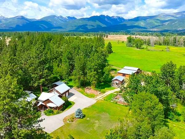70 Acres of Land with Home for Sale in Victor, Montana