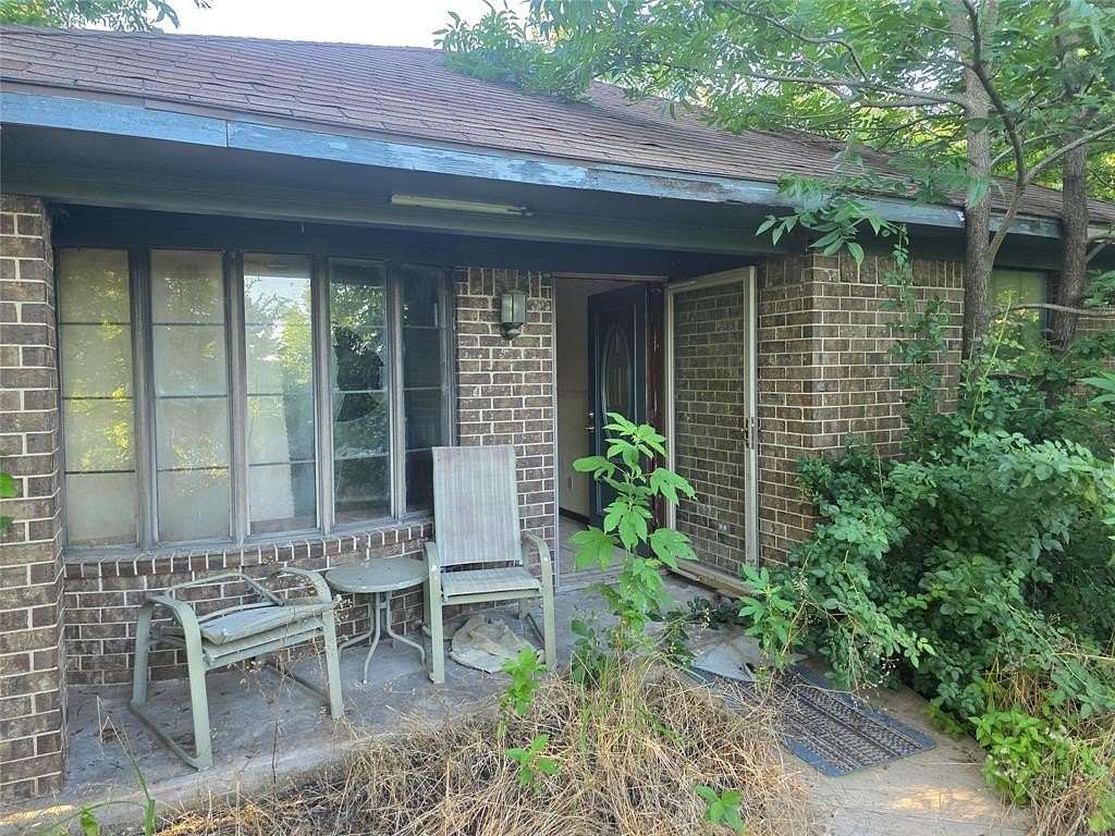 2 Acres of Residential Land with Home for Sale in Commerce, Texas