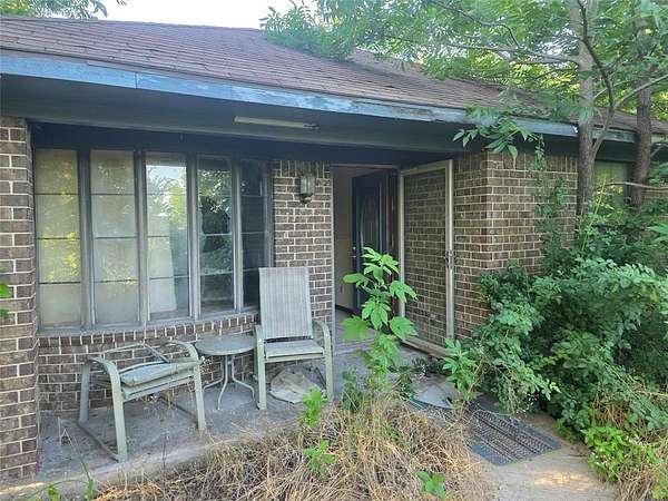 2 Acres of Residential Land with Home for Sale in Commerce, Texas