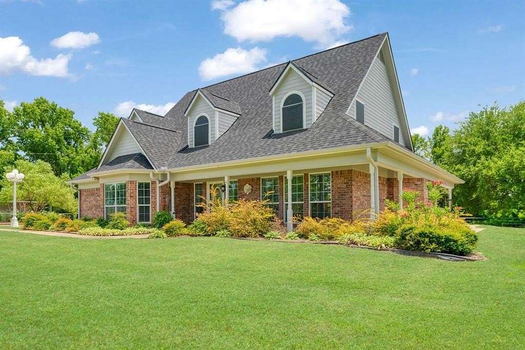 13 Acres of Land with Home for Sale in Bogata, Texas