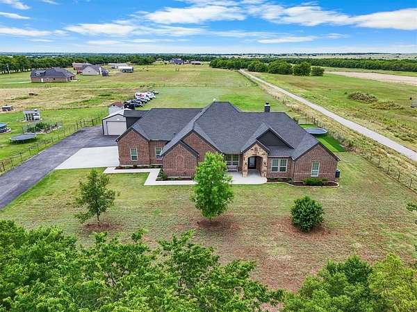 2 Acres of Residential Land with Home for Sale in Krum, Texas
