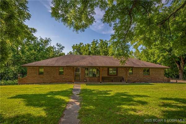 118 Acres of Recreational Land with Home for Sale in Stover, Missouri