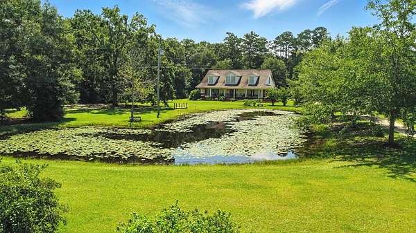 2 Acres of Residential Land with Home for Sale in Carriere, Mississippi