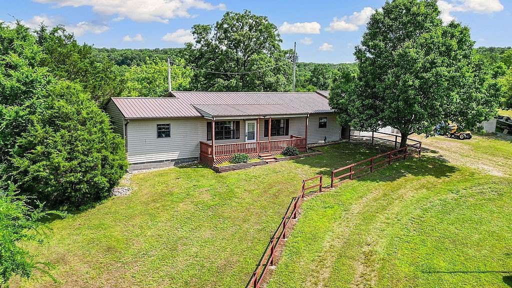 10 Acres of Recreational Land with Home for Sale in Noel, Missouri