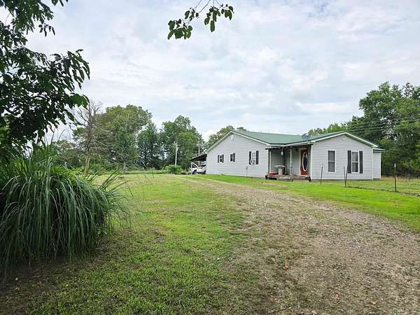 2.6 Acres of Residential Land with Home for Sale in Mena, Arkansas