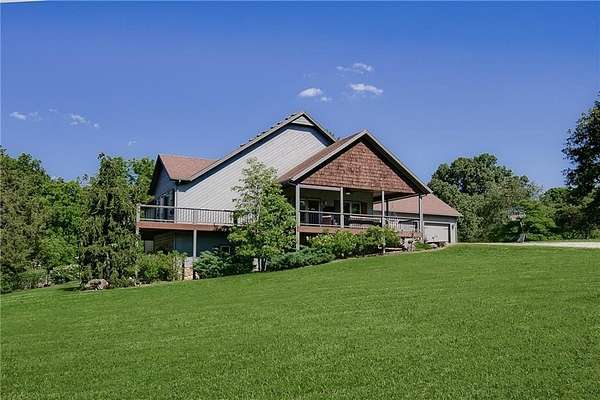 5 Acres of Residential Land with Home for Sale in Bentonville, Arkansas