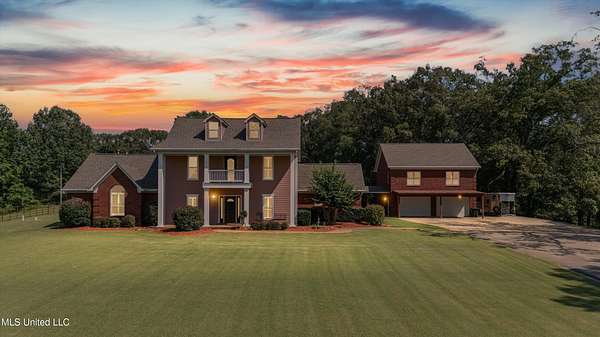 16.3 Acres of Land with Home for Sale in Coldwater, Mississippi