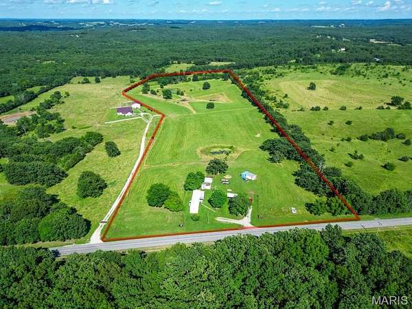 29.2 Acres of Land with Home for Sale in Richland, Missouri
