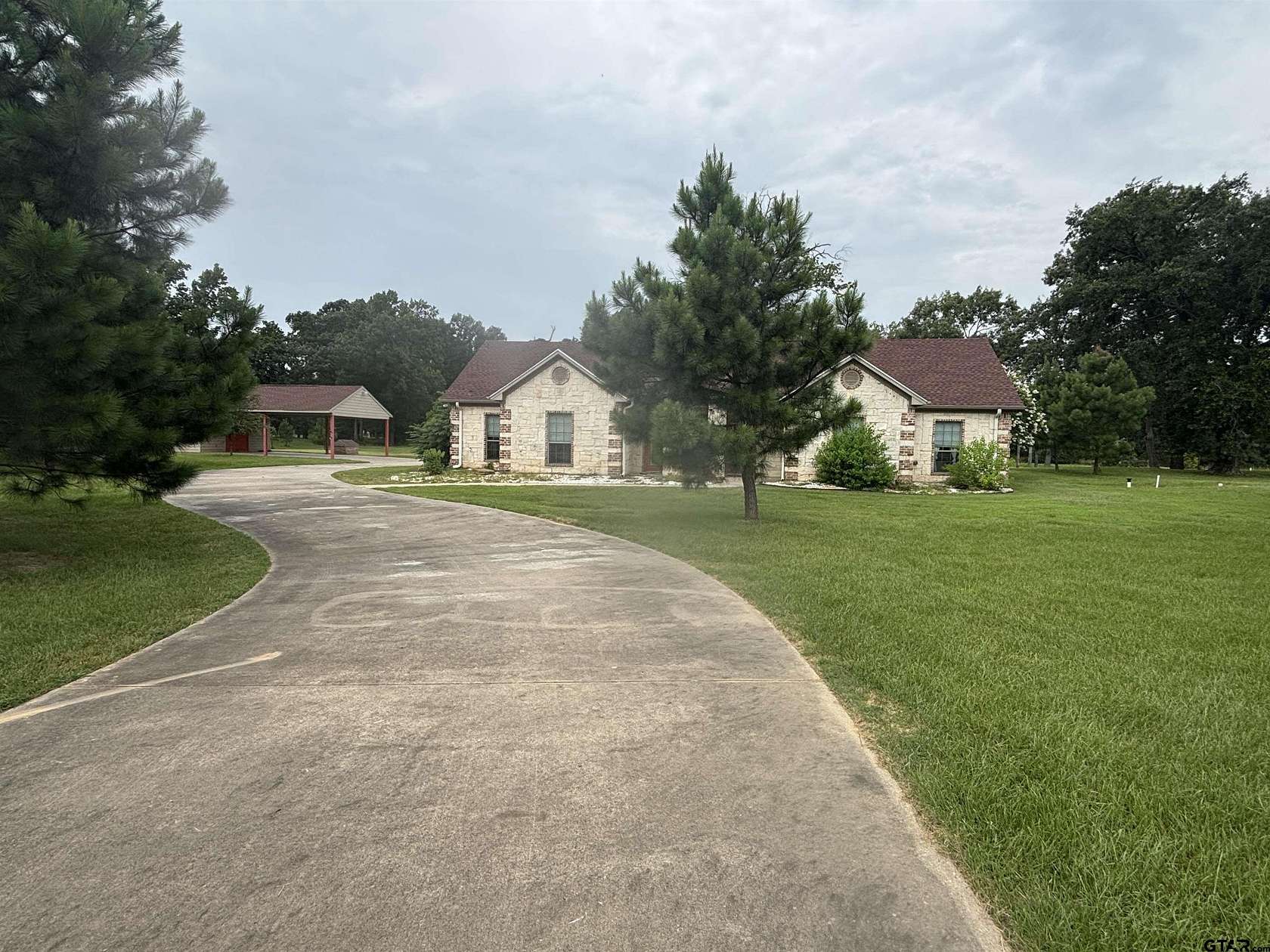 8.9 Acres of Residential Land with Home for Sale in Pittsburg, Texas