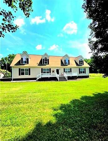 16.6 Acres of Land with Home for Sale in North Wilkesboro, North Carolina