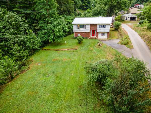 18 Acres of Land with Home for Sale in Langley, Kentucky