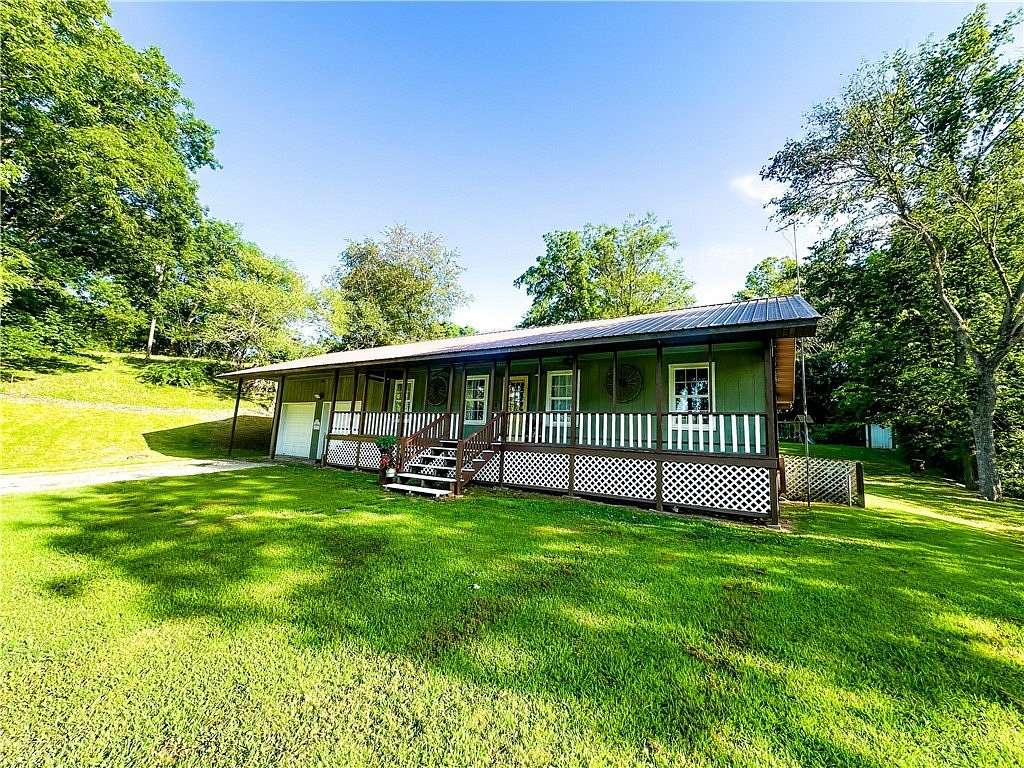 1 Acre of Land with Home for Sale in Green Forest, Arkansas