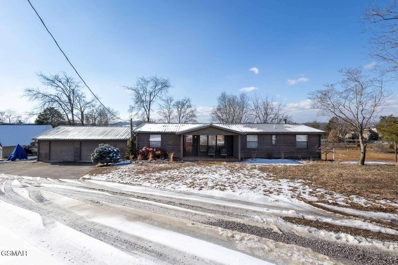 2.26 Acres of Residential Land with Home for Sale in Dandridge, Tennessee