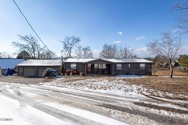 2.26 Acres of Residential Land with Home for Sale in Dandridge, Tennessee