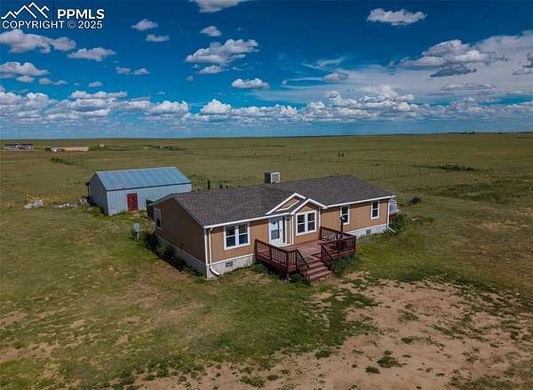 40 Acres of Agricultural Land with Home for Sale in Yoder, Colorado