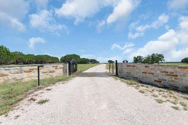 400 Acres of Agricultural Land with Home for Sale in Burnet, Texas