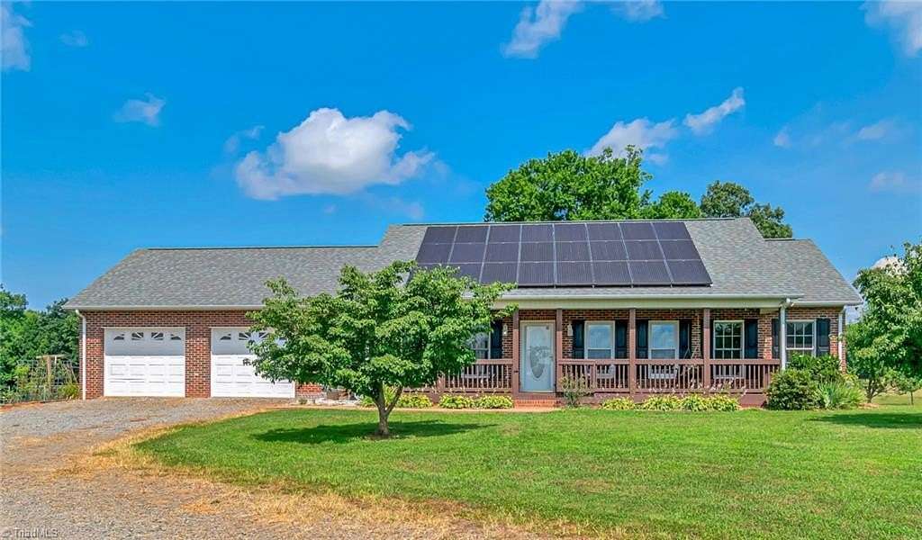 48.7 Acres of Agricultural Land with Home for Sale in Roaring River, North Carolina