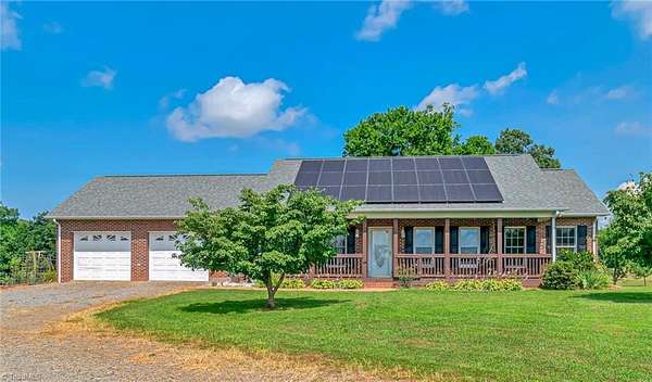 48.7 Acres of Agricultural Land with Home for Sale in Roaring River, North Carolina