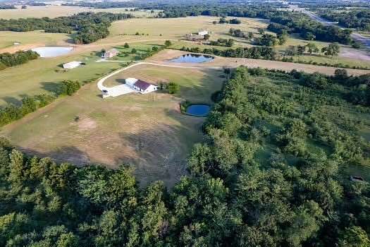 10.4 Acres of Land with Home for Sale in Calera, Oklahoma