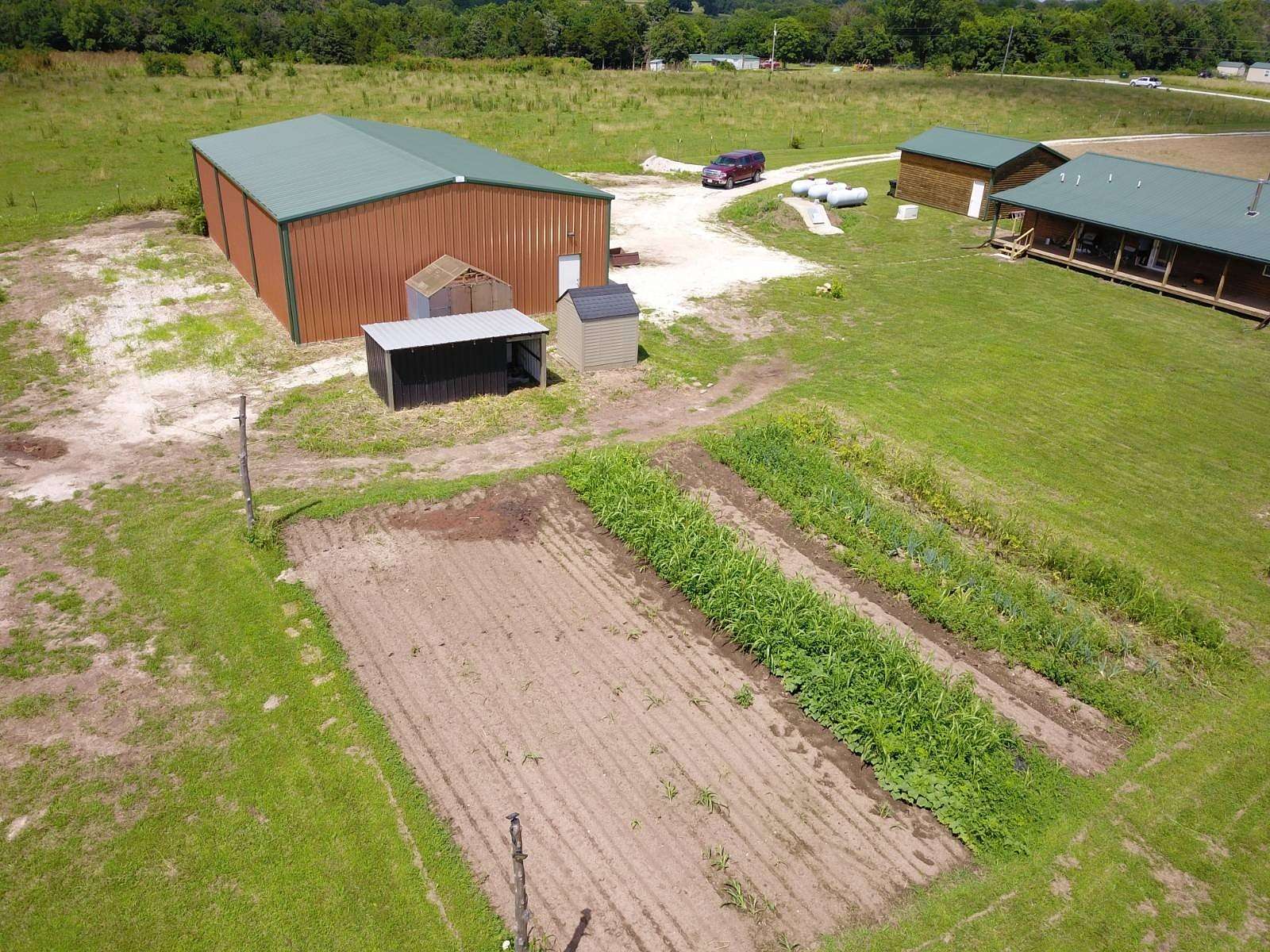 5 Acres of Residential Land with Home for Sale in Stockton, Missouri