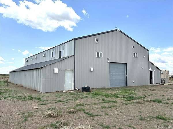 59.3 Acres of Agricultural Land with Home for Sale in Alamosa, Colorado