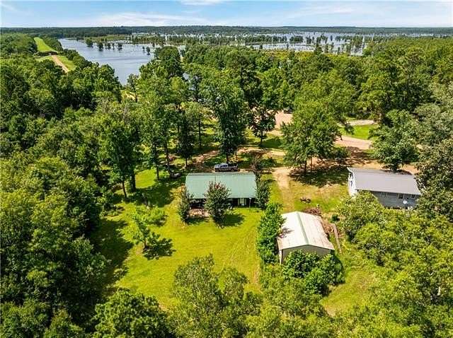 11.7 Acres of Land with Home for Sale in Colfax, Louisiana