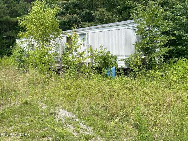 3.49 Acres of Residential Land with Home for Sale in Niota, Tennessee