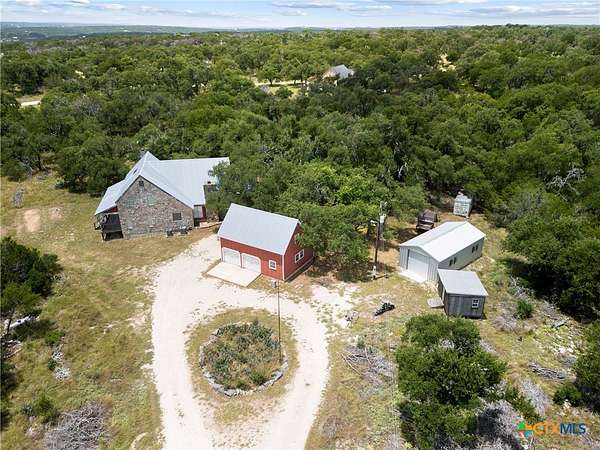 7.27 Acres of Residential Land with Home for Sale in Wimberley, Texas