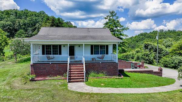 9.58 Acres of Residential Land with Home for Sale in Surgoinsville, Tennessee