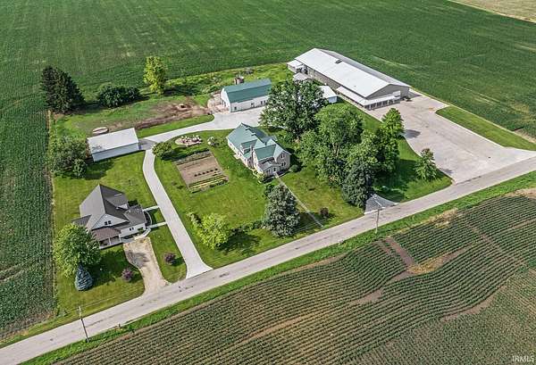 5 Acres of Residential Land with Home for Auction in Etna Green, Indiana