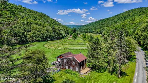 90.2 Acres of Agricultural Land with Home for Sale in Starlight, Pennsylvania