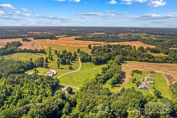 51.7 Acres of Agricultural Land with Home for Sale in Olin, North Carolina