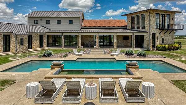 50.7 Acres of Agricultural Land with Home for Sale in Crowley, Texas