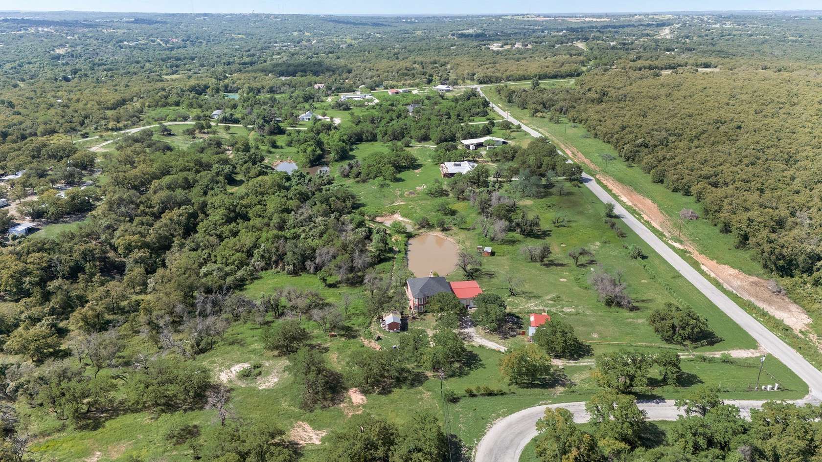 10.2 Acres of Land with Home for Sale in Springtown, Texas