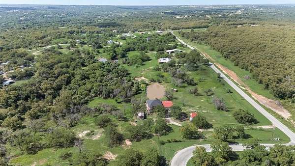 10.2 Acres of Land with Home for Sale in Springtown, Texas