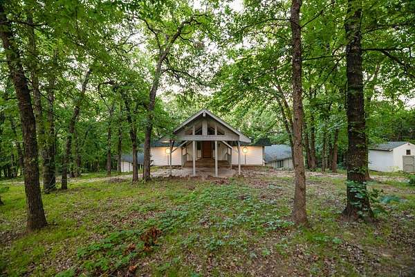 7.29 Acres of Land with Home for Sale in Denison, Texas