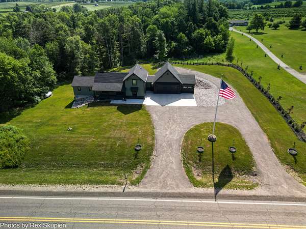 17.2 Acres of Recreational Land with Home for Sale in Kent City, Michigan