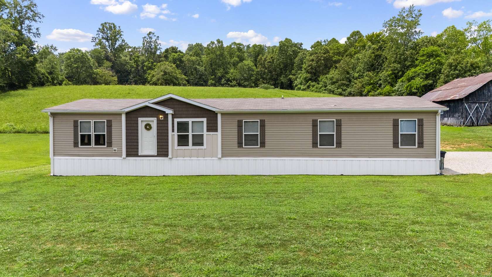 4.8 Acres of Residential Land with Home for Sale in West Liberty, Kentucky