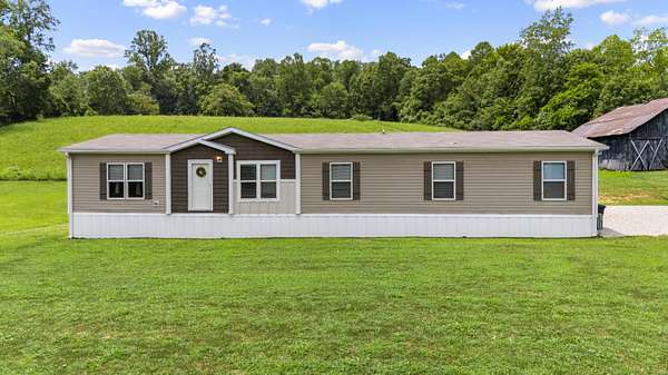 4.8 Acres of Residential Land with Home for Sale in West Liberty, Kentucky