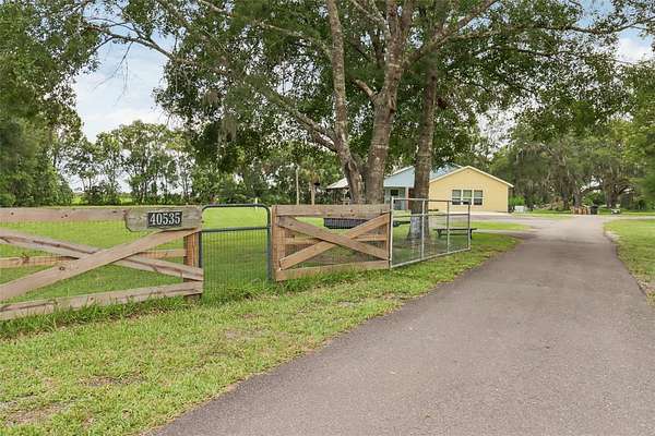 5.15 Acres of Residential Land with Home for Sale in Umatilla, Florida