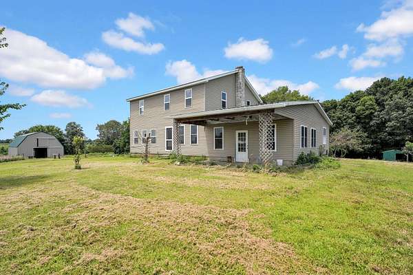 23.6 Acres of Land with Home for Sale in Marion, Kentucky