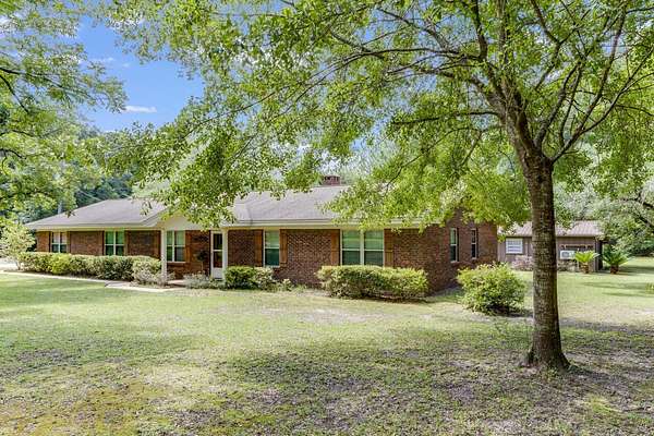 17.4 Acres of Land with Home for Sale in Baker, Florida