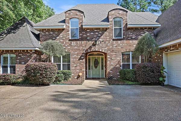 3.9 Acres of Residential Land with Home for Sale in Brandon, Mississippi