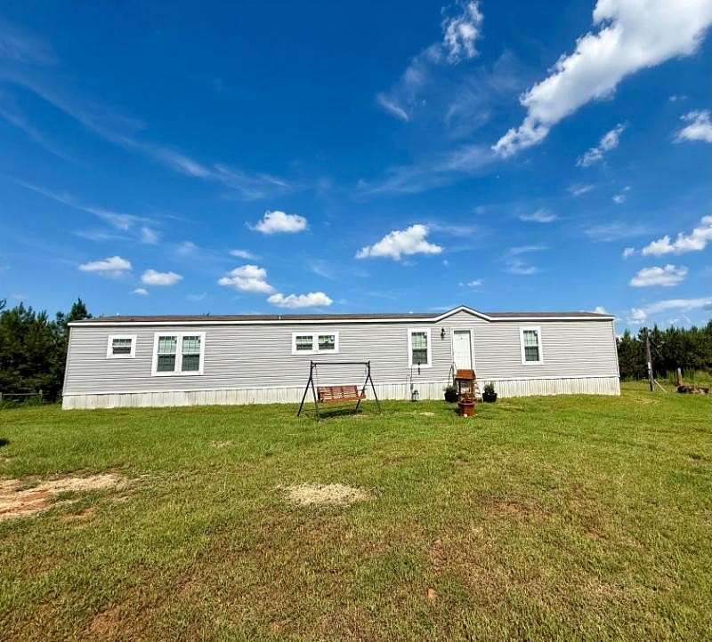 51.3 Acres of Recreational Land with Home for Sale in Golden, Mississippi