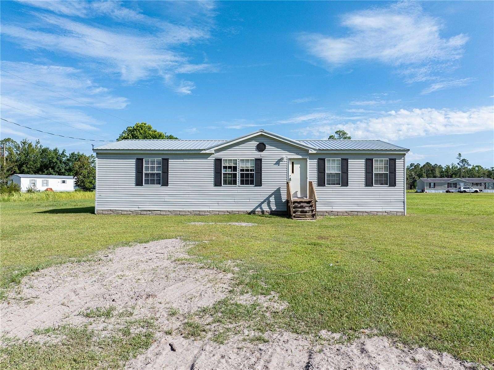 1.5 Acres of Residential Land with Home for Sale in Lake Butler, Florida