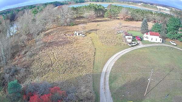 2 Acres of Residential Land with Home for Sale in Evart, Michigan