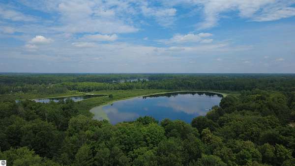 0.57 Acres of Land for Sale in Lupton, Michigan