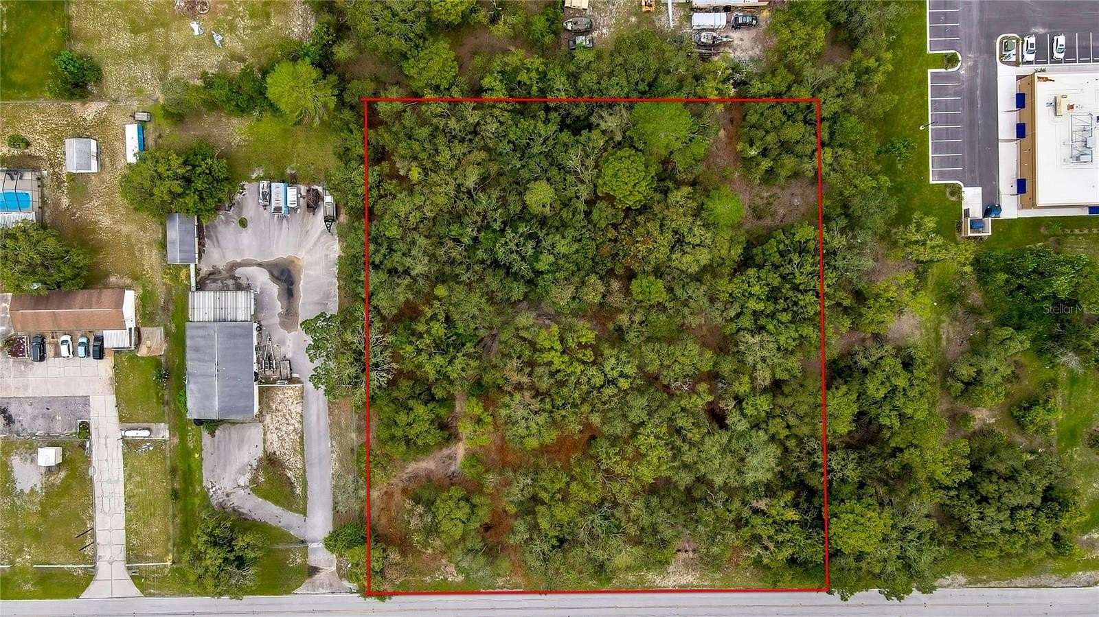 1.76 Acres of Commercial Land for Sale in Spring Hill, Florida
