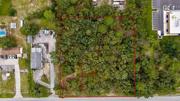 1.76 Acres of Commercial Land for Sale in Spring Hill, Florida