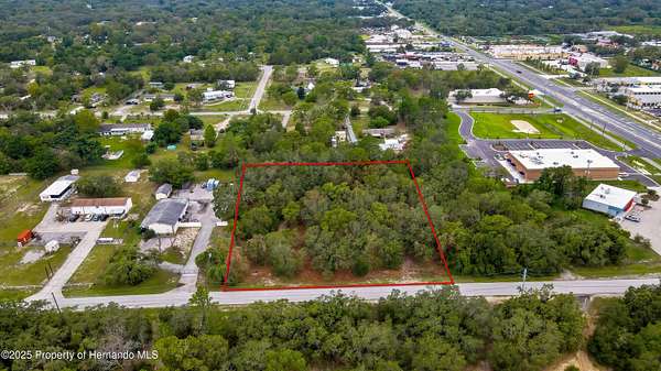 1.76 Acres of Commercial Land for Sale in Spring Hill, Florida